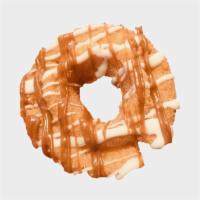 The Churro · Classic crunchy-chewy cake doughnut dipped in cinnamon sugar and drizzled with vanilla frost...