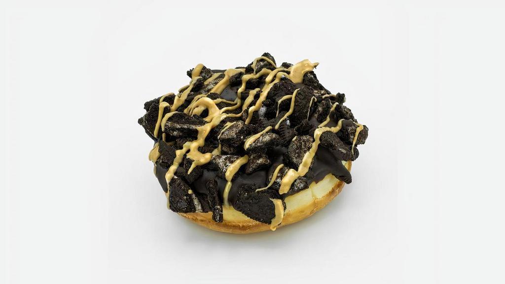 Vegan Old Dirty Bastard · Vegan raised yeast doughnut with chocolate frosting, chocolate cream-filled cookies, and peanut butter.