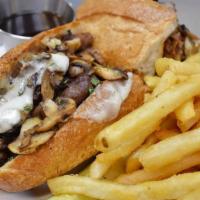 Philly Steak Sandwich · Beef or chicken with freshly grilled onions, green peppers, mushrooms, and cheese.