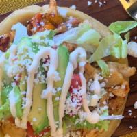 Sope · Homemade fried masa base with a refried bean spread and choice of Protein 
toppings based on...