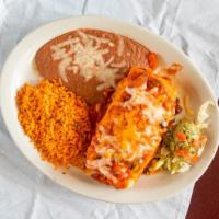 Chimichanga · Large flour tortilla with your choice of chicken, beef fajita or brisket, topped with ranche...