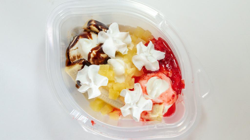 Banana Split · Our banana split is made with delicious, creamy DQ®vanilla soft serve nestled between sweet banana slices and covered in luscious strawberry, pineapple, chocolate, and whipped toppings.