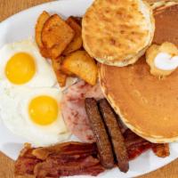 Country Style Breakfast · 2 eggs any style, 2 slices bacon, ham, 2 sausage links, home fries and choice of pancakes or...
