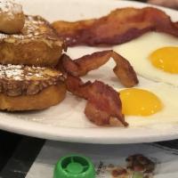 French Toast Trio · 2 slices bacon or 2 sausage links or 2 sausage patties, 2 eggs and french toast.