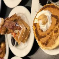 Pumpkin Pancakes · 3 of our homemade recipe Pancakes swirled with pumpkin pie filling, served with whipped crea...