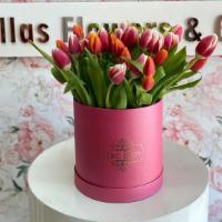 Tulips · 30 TULIPS IN A HANDMANDE BOX
COLORS VARY ACCORDING TO AVAILABILITY