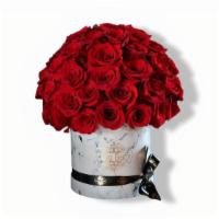 Real Love · 60 FRESH NATURAL  RED ROSES IN A SMALL CILINDER

BOX COLORS AVAILABLE: 

LIGHT PINK - WHITE ...