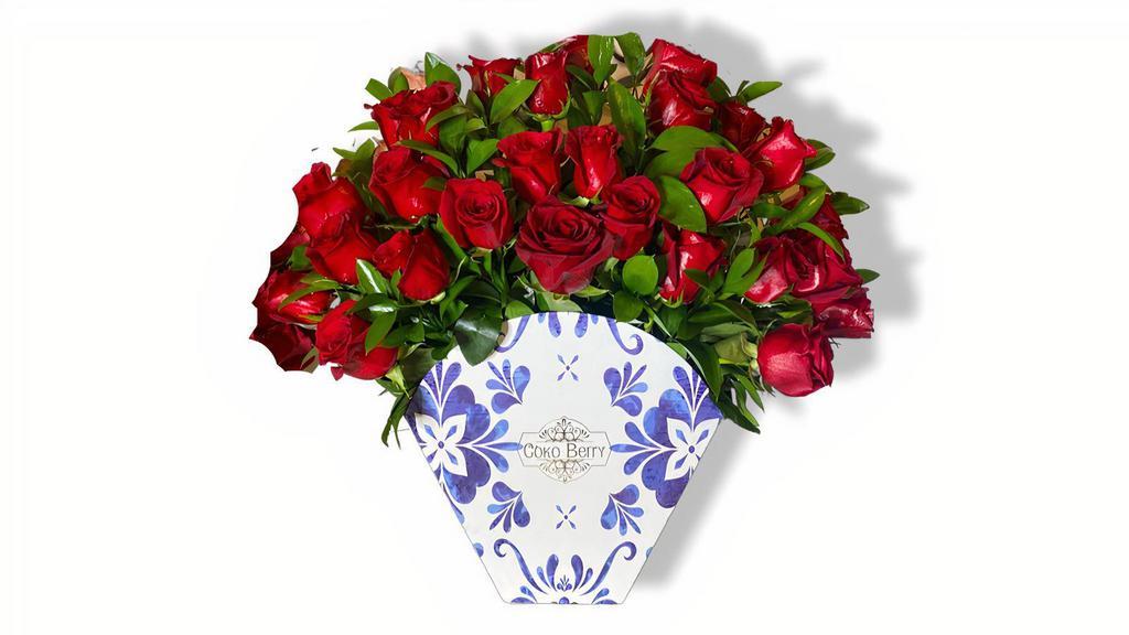 Satisfy My Soul · This beautiful flower arrangement is one of the most sophisticated and elegant. The beautiful box is made of rigid cardboard and contains about 25 natural red roses and ruskus. The box with the flowers is 12 to 14 ”wide and is accompanied by a beautiful bow.