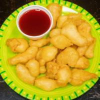 Sweet & Sour Chicken · 375 calories. Breaded chicken cubes deep-fried, served with a sweet and sour sauce on the si...