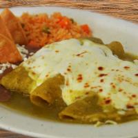 Enchiladas Suizas (4) · Four corn tortillas rolled and filled with chicken. Covered with green salsa and melted chee...