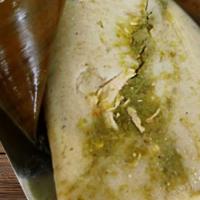 Banana Leaf Tamal (Oaxaqueno) · The tamales are stuffed with chicken in red sauce or pork in green sauce. Wrapped with banan...