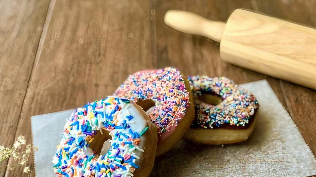 Sprinkle Donut · Icing: Choose from Chocolate, Vanilla, or Strawberry Sprinkles: Choose from jimmies or nonpareils Add a note under Special Instruction.