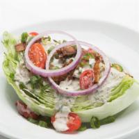 Wedge Salad · iceberg, heirloom tomatoes, bacon, red onion, blue cheese. Gluten friendly.