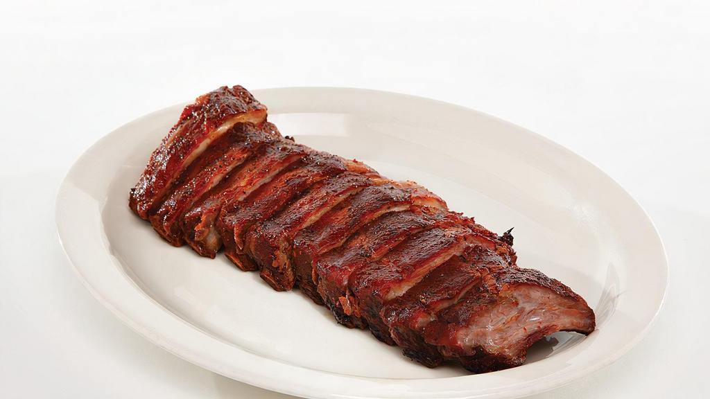 Baby Back Ribs · 1/2 rack of slow smoked pork ribs. served with our homemade bbq sauce.