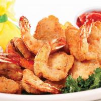 Fried Shrimp · Lightly breaded and fried until golden and served with French fries.