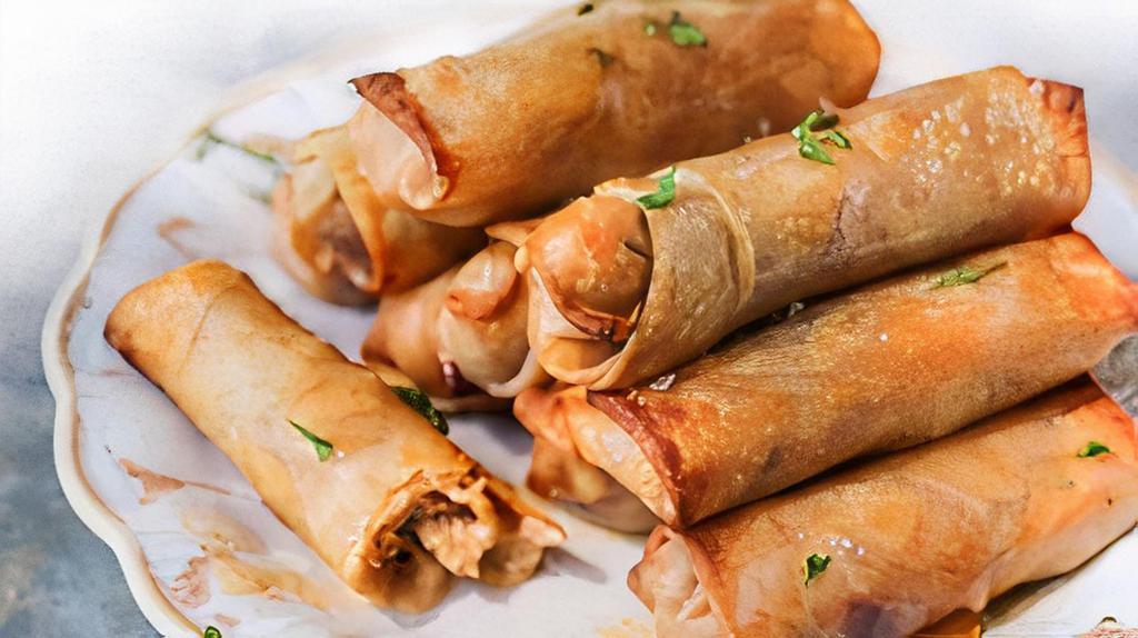 Chicken Egg Rolls (2) · Cabbage, carrots, green onions and veggies fried in a crispy wonton wrapper.