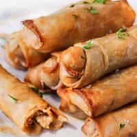 Veggie Egg Rolls (2) · Cabbage, carrots, green onions and veggies fried in a crispy wonton wrapper.