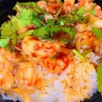 Crawfish Rice Bowl · Jasmine Rice & Sauteed Crawfish Tails topped with Cilantro and your choice of butter.