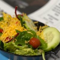 Ashley Side Salad (No Meat) · Romaine hearts, spring mix, grape tomatoes, cucumber, bell pepper and cheddar cheese.