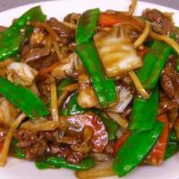 Beef Snow Peas · Snow pea, bok choy, carrot, mushroom, bamboo shoot, and water chestnut. Served with steamed ...