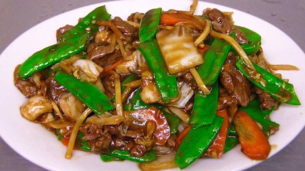 Beef Snow Peas · Snow pea, bok choy, carrot, mushroom, bamboo shoot, and water chestnut. Served with steamed or fried rice.