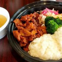 Bulgogi Pork · Grilled sliced pork marinated with soy sauce, ginger, garlic, and more. Served with Fried/Wh...