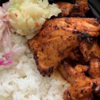 Chicken Breast · Grilled chicken breast marinated with soy sauce, ginger, garlic, and more. Served with Fried...