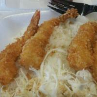Shrimp Tempura · Lightly breaded and fried shrimp. Served with fried or white rice, green cabbage, and our sp...