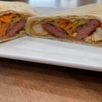 Chicken Shawarma Wrap · Chicken breast, lettuce, shredded carrot, frankfurter,  with our FV sauce wrapped in tortilla.