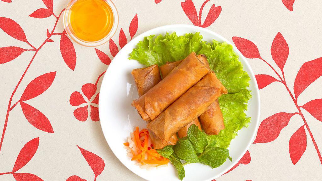 Fried Egg Rolls · Two crispy egg rolls filled with pork and served with house dipping sauce.
