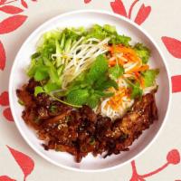 Pork Vermicelli Bowl · Marinated pork with lettuce, cucumber, and basil topped with crushed peanut, green onion, pi...