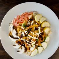 Chicken Shawarma Rice Plate · Chicken Shawarma meat served with Rices and Side Veggies (Tomatoes, Onions & Pickles). Garli...