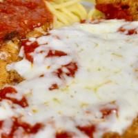 Parmigiana · Your choice of lightly hand breaded chicken or eggplant, pan fried to a golden brown, covere...