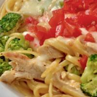 Pack Pasta · Grilled Cajun chicken breast mixed with broccoli and our creamy Alfredo sauce, covered and b...