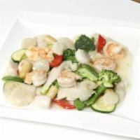 Seafood Delight · fish fillet, shrimp, scallop, crabmeat with mixed vegetables in white sauce