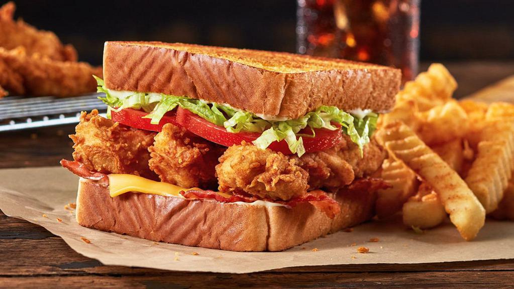 Zaxby'S Club Sandwich Meal · Chicken Fingerz, bacon, crisp lettuce, tomatoes, mayonnaise, and American Cheese on Texas Toast, served with Crinkle Fries and a small sized Coca-Cola Freestyle® drink, over 100 refreshing choices available in-store. (1150-1500 Cal)