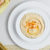 Hummus · Simmered chickpeas pureed and mixed with tahini and fresh lemon juice.