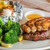 Steak And Shrimp · Top sirloin 8 oz grilled to order with four shrimp and served with choice of two sides.