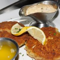 Crab Cakes · Two (2) delicious jumbo lump crab cake(s) served over remoulade sauce.