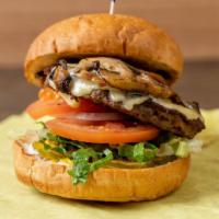 Mushroom & Swiss Burger · 1/3 lb. burger served with lettuce, tomato, onions, pickles and mustard.