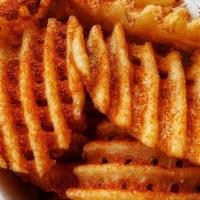 Waffle Fries · Waffle fries with mild seasoning.
