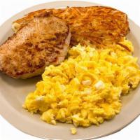 Pork Chop And Two Eggs Any Style · Served with hash browns and a choice of toast or a hot biscuit and gravy.