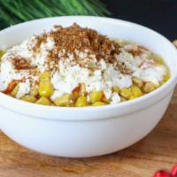 *Corn In A Cup · Sweet corn with butter, mayonnaise, Mexican cream, queso fresco, and chile-lime powder. You’...