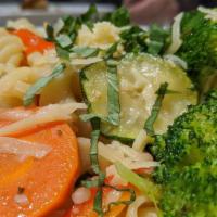 Pasta Primavera · Fusilli with carrots, broccoli, zucchini, yellow squash, and red peppers topped with basil a...