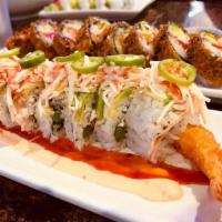 R8 Latino Roll · Tempura shrimp, cream cheese, cilantro, cucumber, topped with avocado, spicy crab, and jalep...