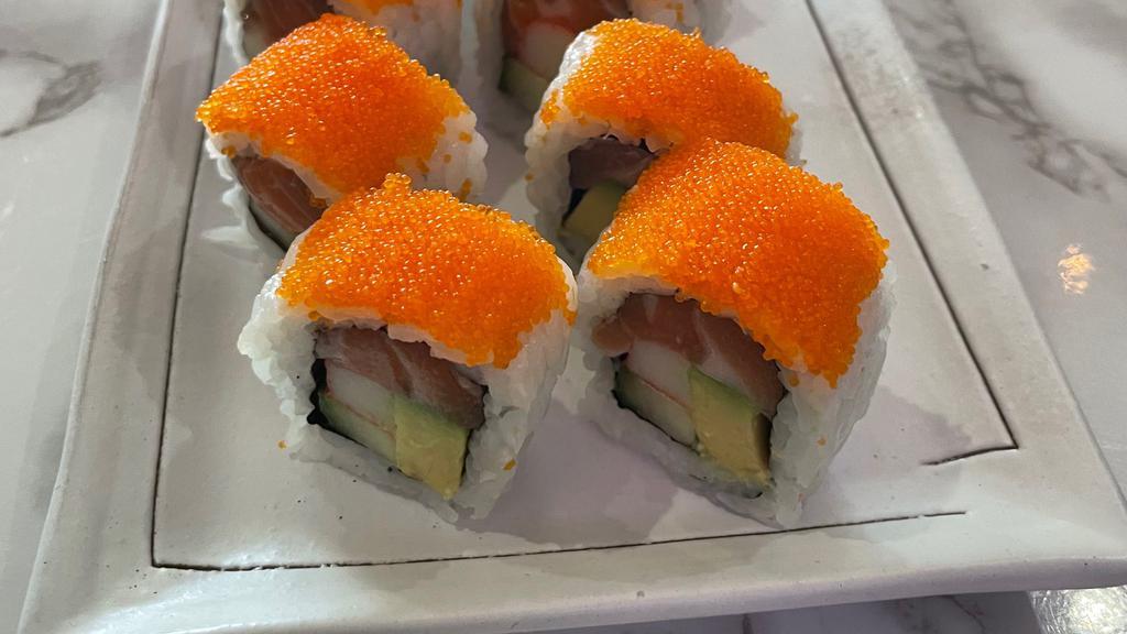 Sunrise Roll · Salmon,Krab,Avocado and cucumber inside topped with masago.