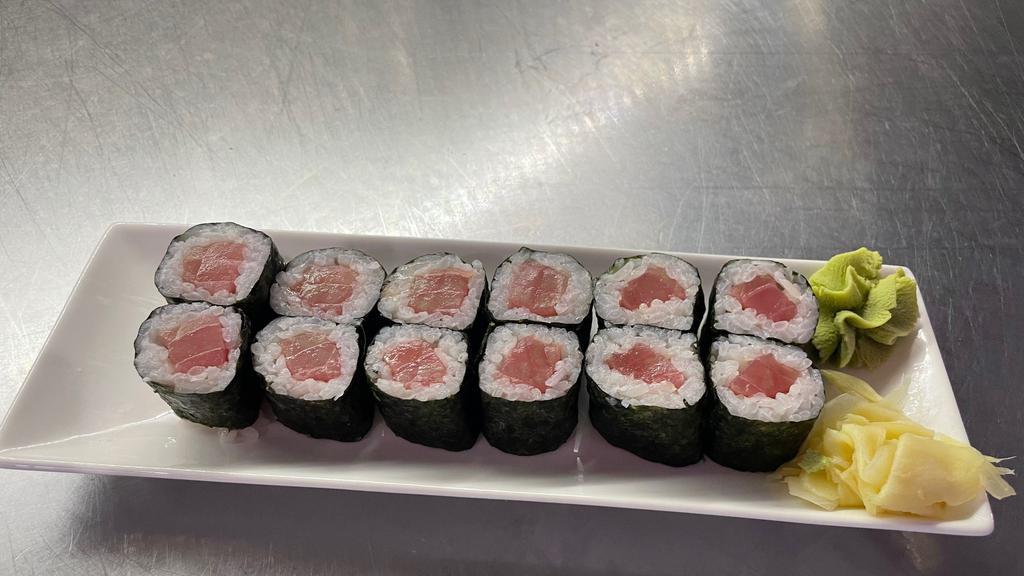 Tuna Roll (Maki) · Fresh Tuna Only roll with rice and Seaweed (outside).
