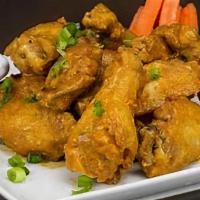 10 Chicken Wings · Celery & bleu cheese dressing, tossed in your choice of sauce: