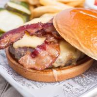 Pub Burger · The Brass Tap signature. Jalapeño cream cheese, smoked Gouda, applewood bacon, lettuce, toma...