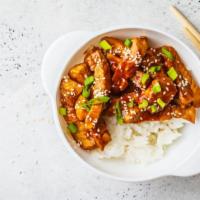 Sesame Chicken Rice Bowl · Rice bowl with chicken in sweet and sour sesame sauce.